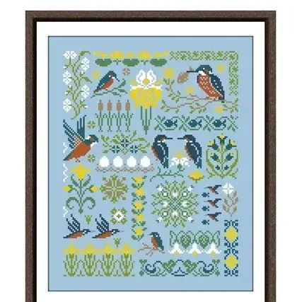 Bird in the Forest cross stitch design CC-K10-04: blue and rust kingfishers among reeds, yellow irises and water lilies on sky-blue fabric