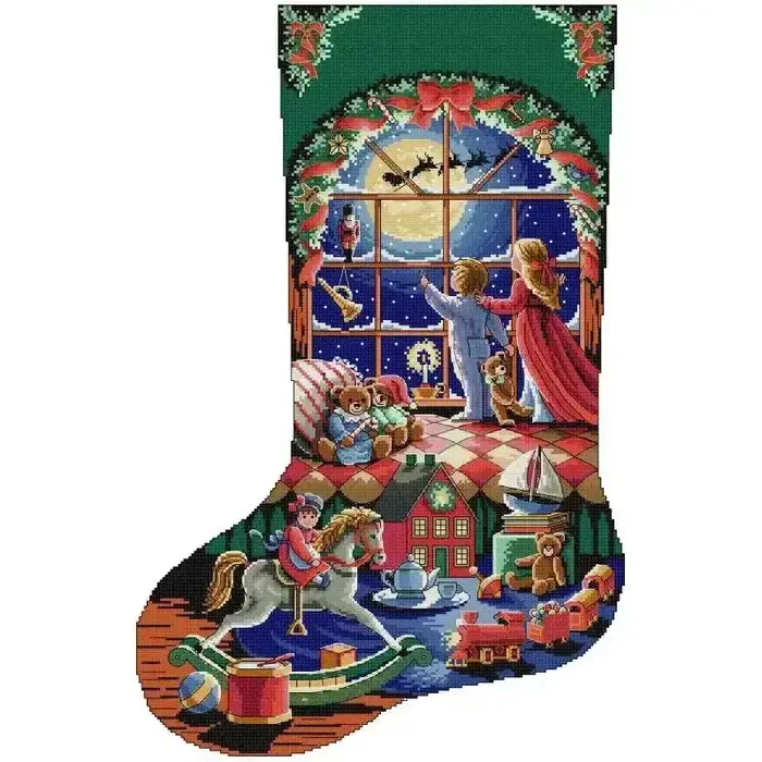 Christmas stocking cross stitch design CC-K13-13 Children's Paradise: children at a window watching Santa's sleigh fly past, with a rocking horse and toys on a green ground