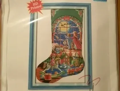 Buyer photo of the Children Paradise stocking kit CC-K13-13: the HD printed stocking panel seen through the kit sleeve, children at a moonlit window above a floor of toys
