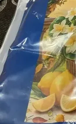 Buyer photo of the Lemons and Jasmine kit CC-K4-01 in 11 count: the printed lemon basket design seen through the packaging film